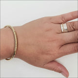 JQIN meditation ring with solid gold spinner
