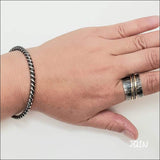 JQIN oxidized meditation spinning ring